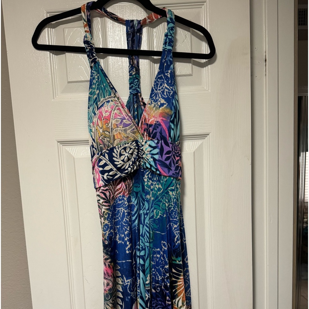 Hawaiian print sleeveless midi length dress. Handkerchief hem. From Hawaii.